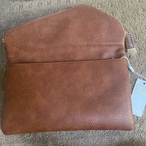 Never been used clutch. Great condition